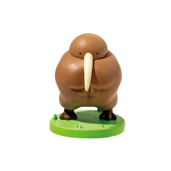 Figura gachapón de kiwi musculoso kawaii de estilo japonés en cápsula sorpresa — Don Gachapón