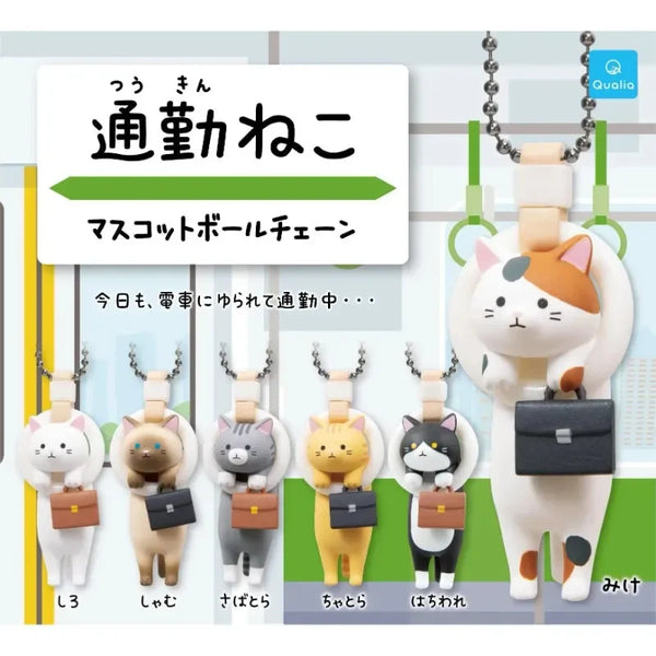 Gato salaryman en el metro · gachapon coleccionable
