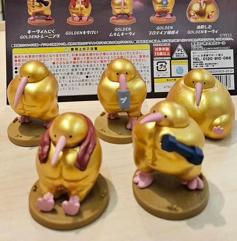 Figura gachapón del kiwi musculoso GOLDEN Mukimuki-wi, coleccionable kawaii de estilo japonés — Don Gachapón