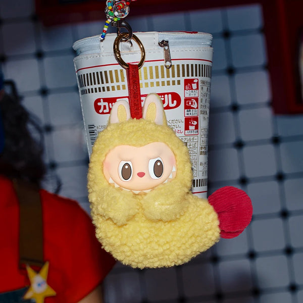 POP MART THE MONSTERS · Wacky Mart (funda auriculares) · gachapon coleccionable